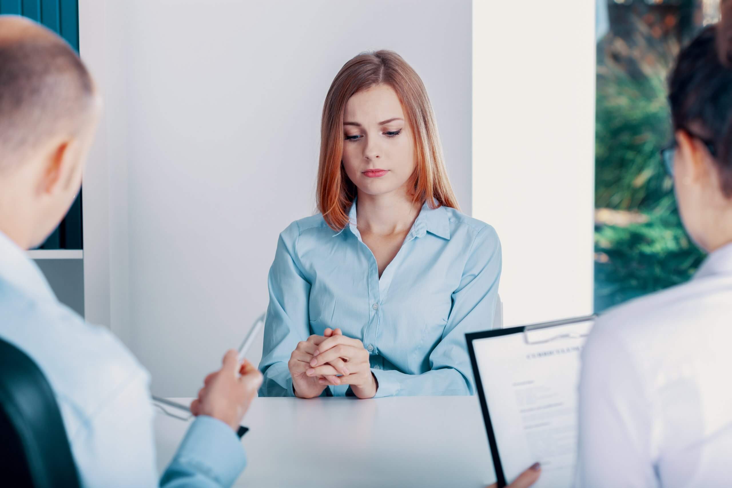 Nervous young apprentice during a job interview in a corporation